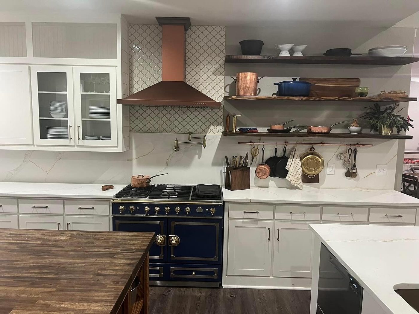 Kitchen remodel with copper range hood